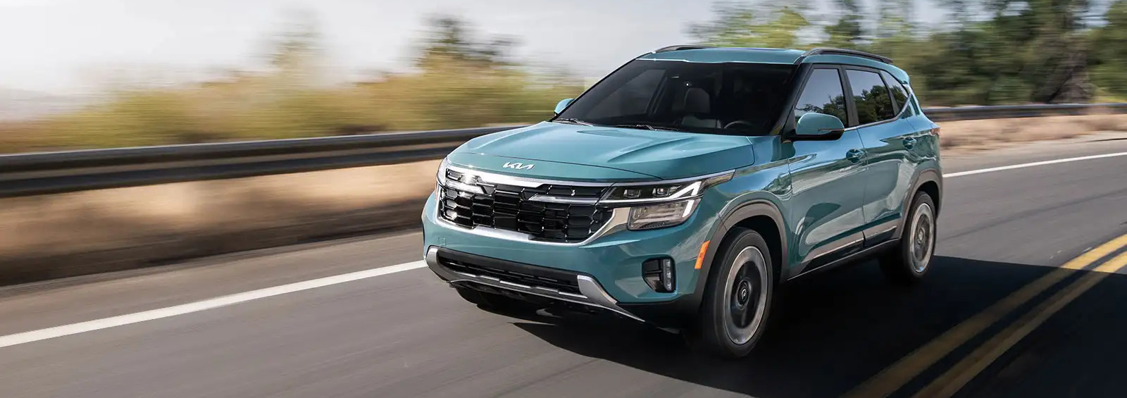 2026 Kia Seltos moving on road during daylight