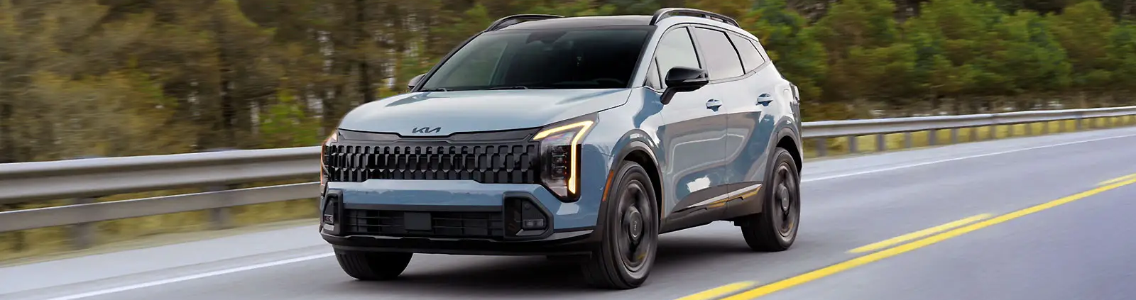 2026 Kia Sportage driving on road