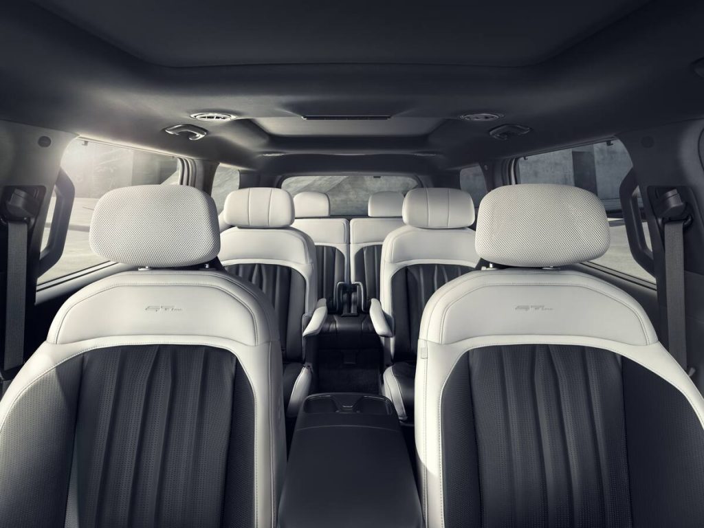 EV9 interior with three rows of seats, highlighting family-friendly space and access.