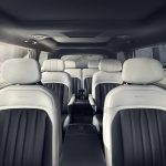 EV9 interior with three rows of seats, highlighting family-friendly space and access.