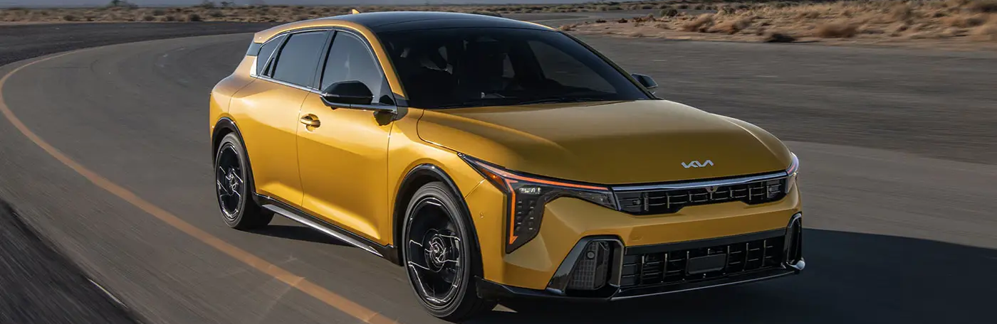 2026 Kia K4 driving on road
