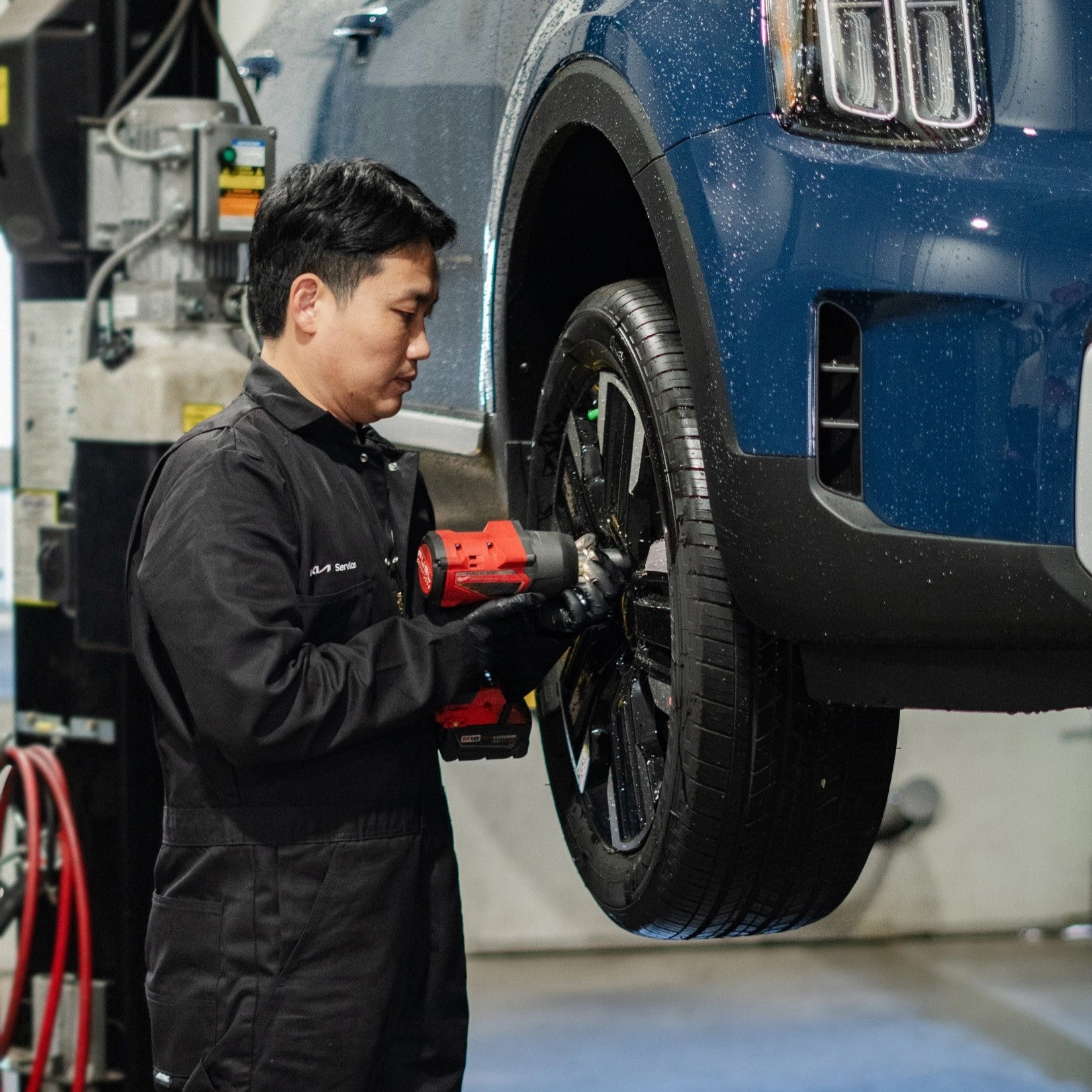 Technician installing tires