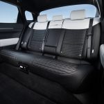 Rear passenger seats in 2026 EV4 are two-toned in dark grey and cream.