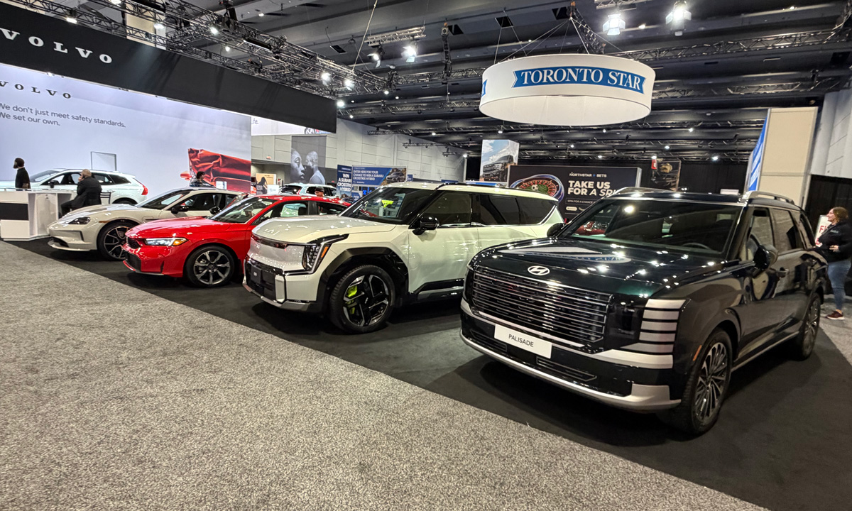 AJAC 2026 award-winning vehicles displayed at the Canadian International AutoShow including Kia EV9, Hyundai Palisade, Honda Civic and Porsche Taycan