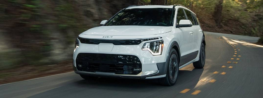 2026 kia niro ev driving down road
