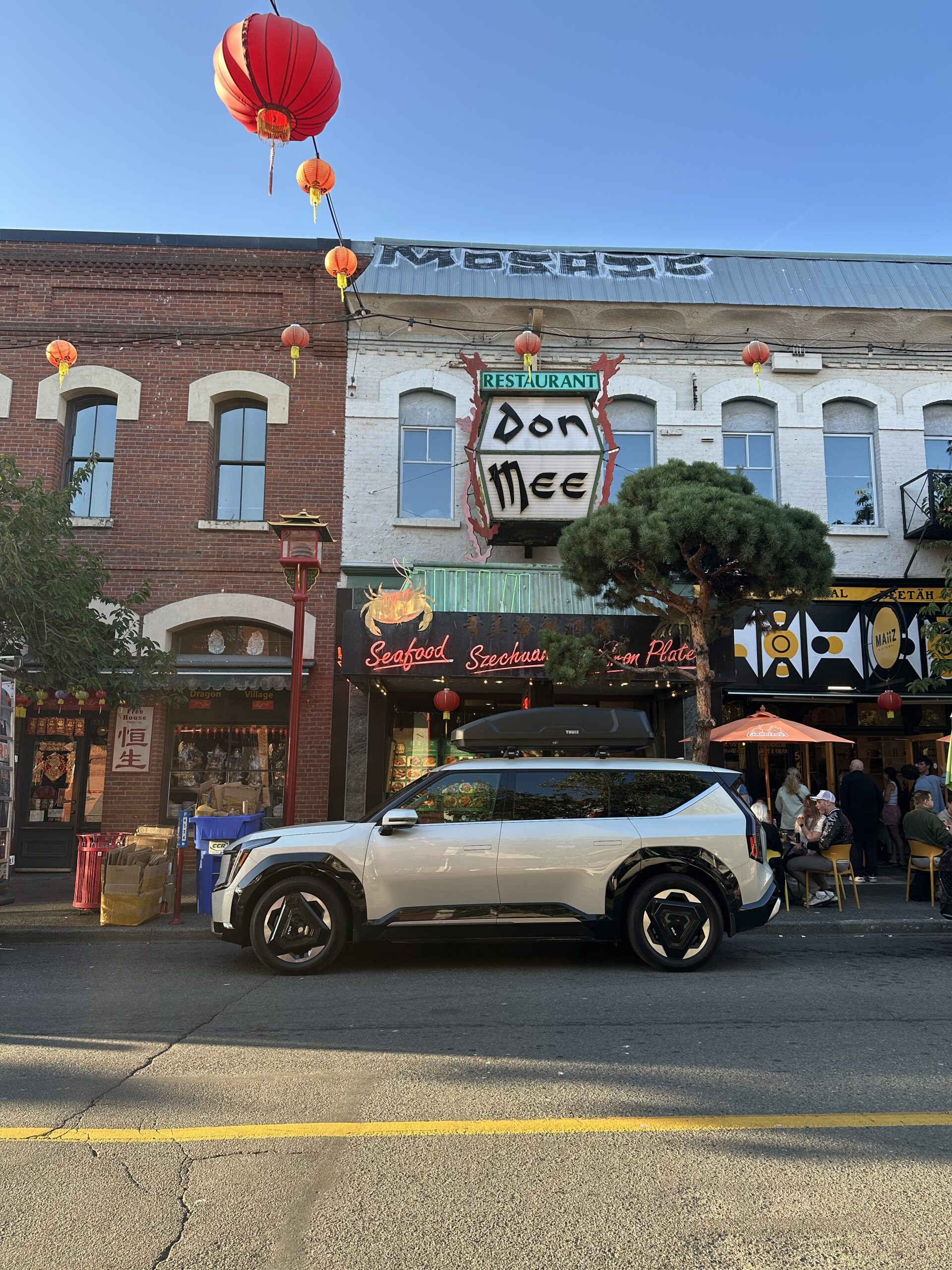 Kia EV9 electric SUV in Chinatown Victoria BC on Fisgard Street